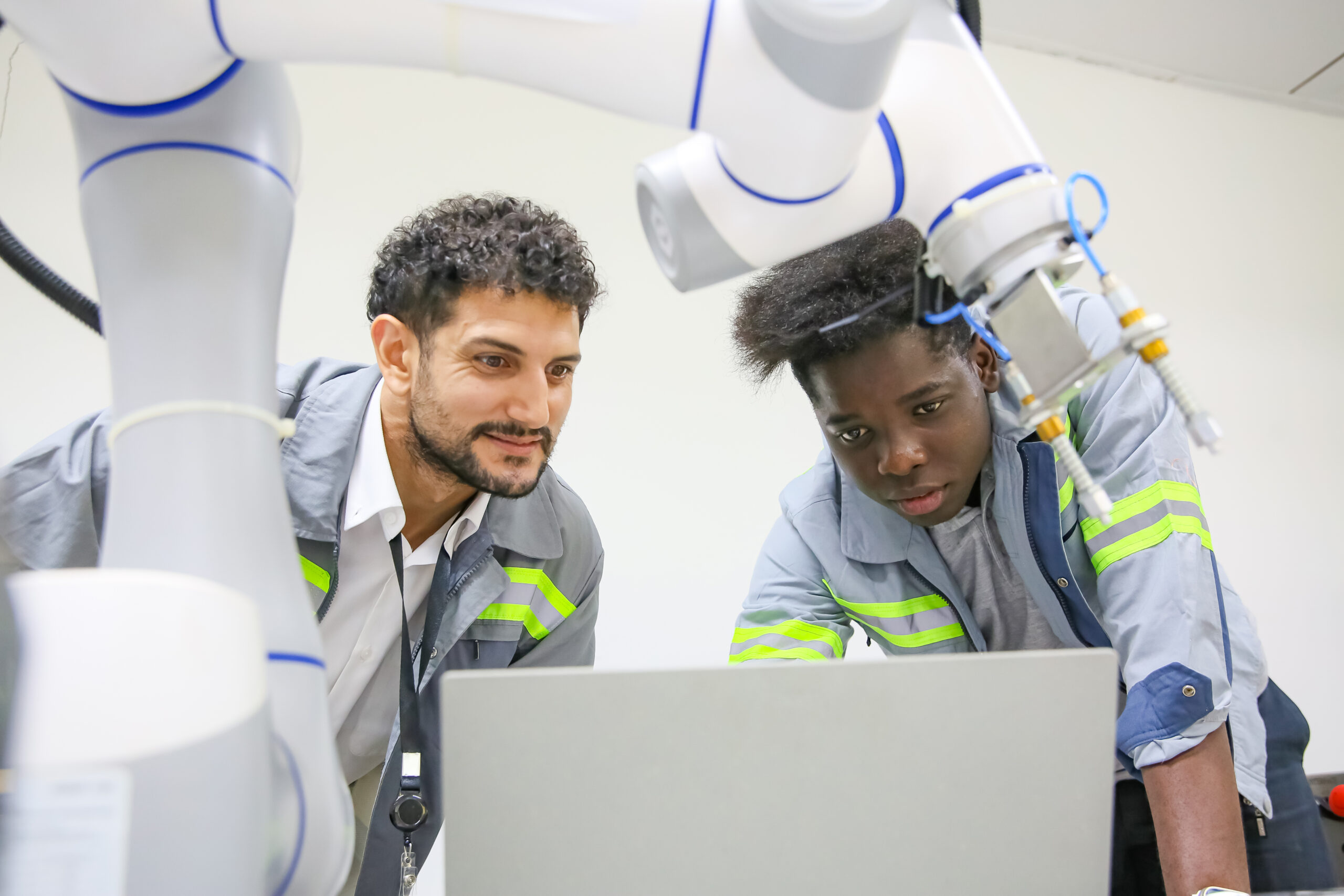 Technicians checking on machine